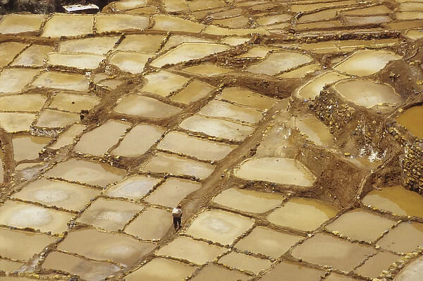 Workers still collect salt from the Maras Salinas, much as they did in the time of the Incas