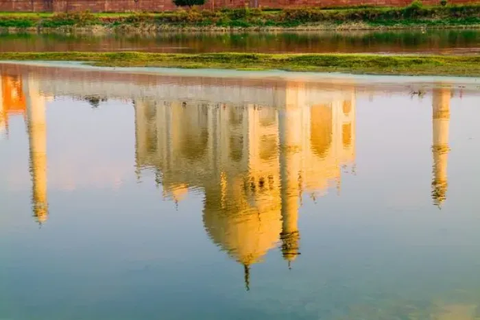 Framed Print : World famous Taj Mahal temple reflection at sunset from Yamuna River in town of Agra India Framed Print : World famous Taj Mahal temple reflection at sunset from Yamuna River in town of Agra India