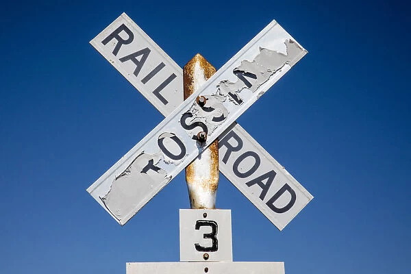 Worn railroad crossing sign, Winona, Washington State