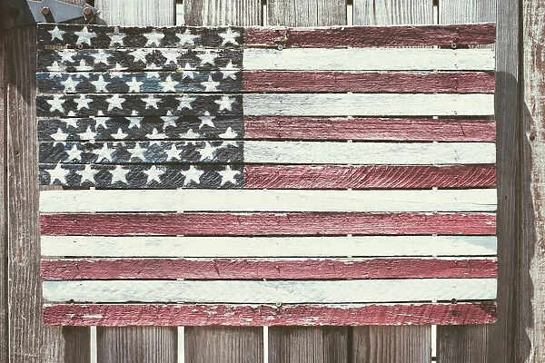 Worn wooden American flag, Fire Island, New York