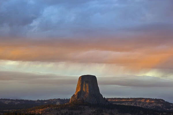 WY, Devils Tower National Monument, Storm at Sunset