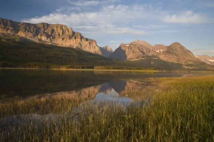 Framed Print : Wynn and Allen Mountains reflect into calm Lake Sherburne in Glacier National Park