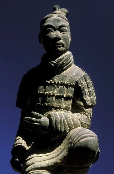 Xi an, China, Miniature sculpture of terracotta warrior sitting cross-legged