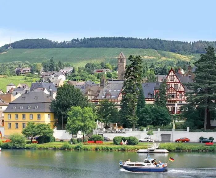 Framed Print : A yacht sails by the town of Traben-Trarbach, Germany along the Mosel River Framed Print : A yacht sails by the town of Traben-Trarbach, Germany along the Mosel River
