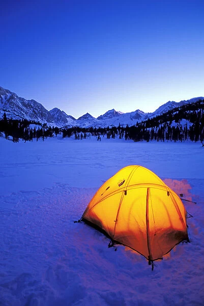Yellow dome tent in winter, John Muir Wilderness, Sierra Nevada Mountains, California, USA