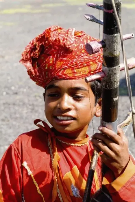 Framed Print : Young boy aged 10 with musical instrument called Sarangi on road to Jodhpur in Rajasthan India