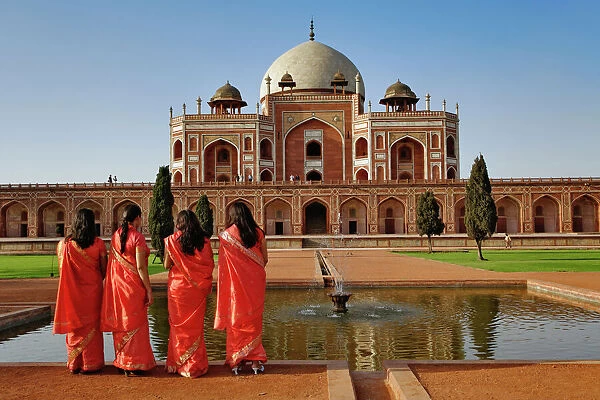 Young Indian ladies and Humayuns Tomb, Delhi, India