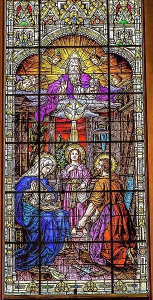 Young Jesus, Mary, Joseph and God the Father stained glass Gesu Church, Miami, Florida. Built 1920's Glass by Franz Mayer