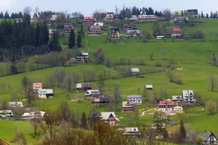 Framed Print : Zakopane nestled in the Tatra Mountains with farmlands, Poland