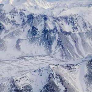 Aerial view of snow covered mountain range, Alaska, USA Aerial view of snow covered mountain range, Alaska, USA