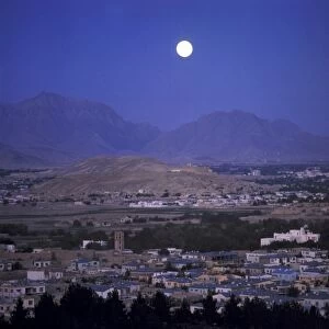 Afghanistan, Kabul. A full moon illuminates the sleeping city of Kabul, Afghanistans capital