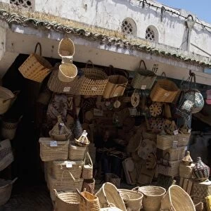 Africa, Morocco, Casablanca. Central Market (aka Olive Market). Basket vendor