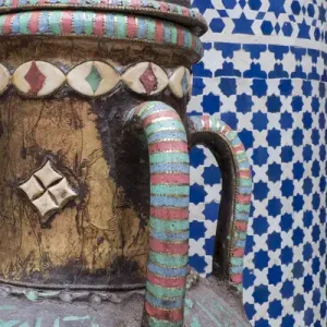 Africa, Morocco, Fes. Vase and pillar details with traditional design in the interior