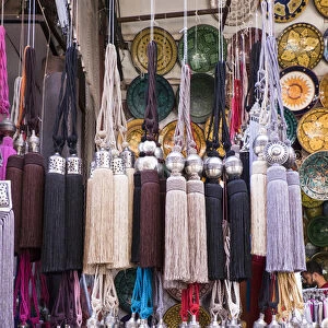 Africa, Morocco, Marrakech. Curtain tie-backs for sale at a market stall in the medina