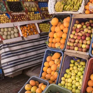 Africa, Morocco, Tinerhir. Fresh fruit for sale in market stall