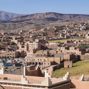 Africa, Morocco. The town of Boulmalne du Dades spills up the hillsides of the Atlas