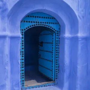 Africa, Morocco. A traditional blue doorway in the hilltown of Chefchaouen