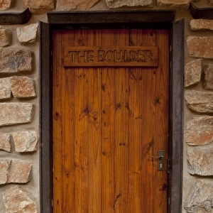 Africa, Namibia, Aus. Front door of Boulder chalet at the Klein Aus Vista. Credit as