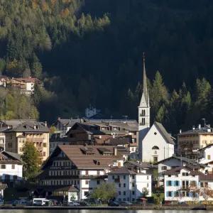 Alleghe at Lago di Alleghe under the peak of Civetta, an icon of the dolomites in