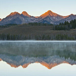Alpenglow; sunrise; reflections; Little Redfish Lake; Sawtooth National Forest; Stanley
