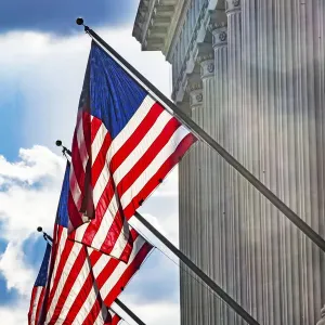 American flags at Herbert Hoover Building, Washington DC, USA