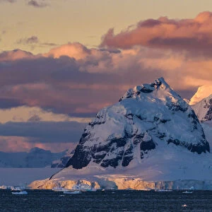 Antarctica, Antarctic Peninsula, Lemaire Channel, glaciated, mountain at sunset