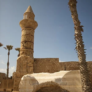 Archeological finds and a restored tower grace the waterfront of ancient Caesarea, Israel