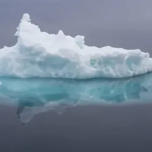 Arctic Ocean, Norway, Svalbard. Iceberg reflects in ocean Arctic Ocean, Norway, Svalbard. Iceberg reflects in ocean