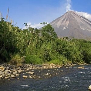 Arenal Volcano and fresh water stream near La Fortuna, San Carlos, Costa Rica