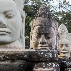 Asia; Cambodia; Angkor Watt; Siem Reap; Deamon heads on the gods and deamon bridge at