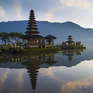 Asia, Indonesia, Bali. Sunrise at Bali water temple: Ulun Danu Temple in Lake Bratan