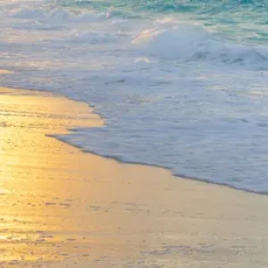 Bahamas, Little Exuma Island. Sunset on beach
