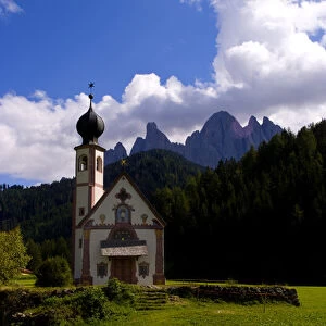 Beautiful isolated lonely church called Rainui in valley in the Italian Dolomites