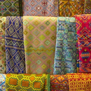 Bhutan, Thimphu. Colorful textiles for sale in a shop