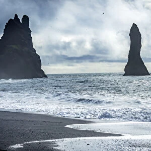 Black sand beach, South Shore, Iceland. Sand is black obsidian