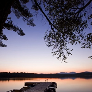The boat dock after sunset at White Lake State Park in Tamworth, New Hampshire