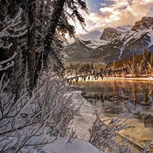 Bow river makes its icy way through Canmore, Canada