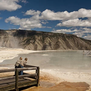 Two boys admiring Canary Springs, Mammoth Terrace, Yellowstone National Park, Gardner