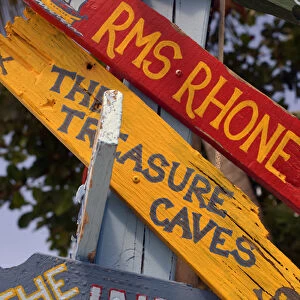 British Virgin Islands, Marina Cay. Colorful painted directional signs