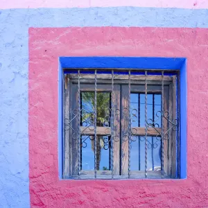 Cabo San Lucas, Mexico. Colorful wall and window