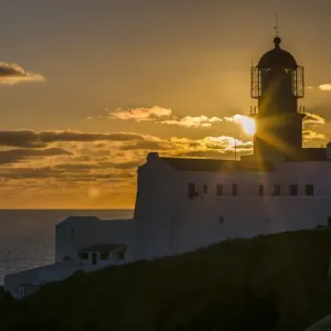 Cabo de Sao Vincente (Cape St. Vincent) with its lighthouse at the rocky coast of Cabo de Sao Vincente (Cape St. Vincent) with its lighthouse at the rocky coast of