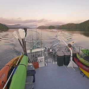 Canada, British Columbia, Calvert Island. Wake of Dolphin Charters boat, Delphinus, on cruise tour