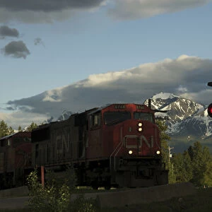 Canada: British Columbia, Valemount, train tracks and light in front of Canoe Mountain