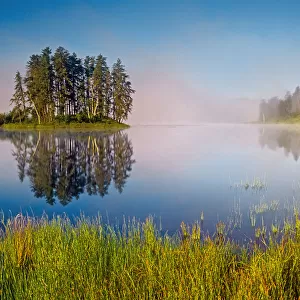 Canada, Ontario. Morning fog on Minnowan Lake