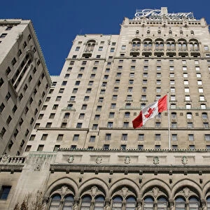 Canada, Ontario, Toronto. Close-up of Fairmont Royal York Hotel flying the Canadian flag