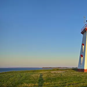 Canada, Prince Edward Island. Souris East Lighthouse on Knight Point at sunrise