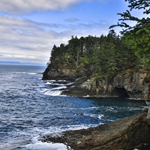 Cape Flattery, Washington. Caves and bluffs at Cape Flattery with water crashing