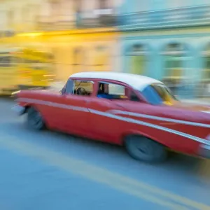 Caribbean, Cuba, Havana, Havana Vieja, UNESCO World Heritage Site, classic car in motion