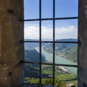 The castle ruin Aggstein high above the Danube in the Wachau. The Wachau is a famous vineyard The castle ruin Aggstein high above the Danube in the Wachau. The Wachau is a famous vineyard