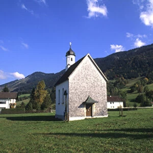 Church Nestled in the Mountains in Halblech Germany